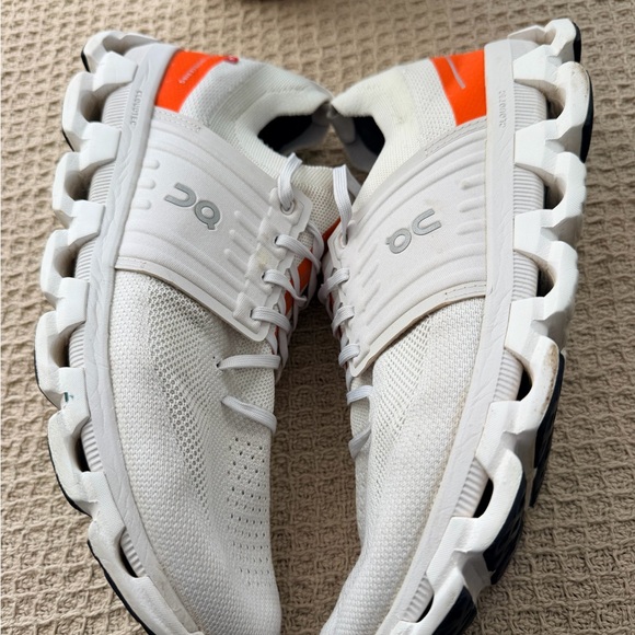 On Cloud Running Sneakers in White with Orange Accents main image 10